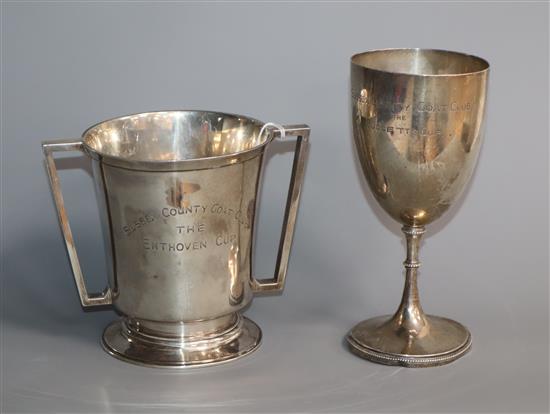 A 1930s Art Deco silver two handled trophy vase by Henry George Murphy, London, 1933 and a silver presentation goblet, 14 oz.